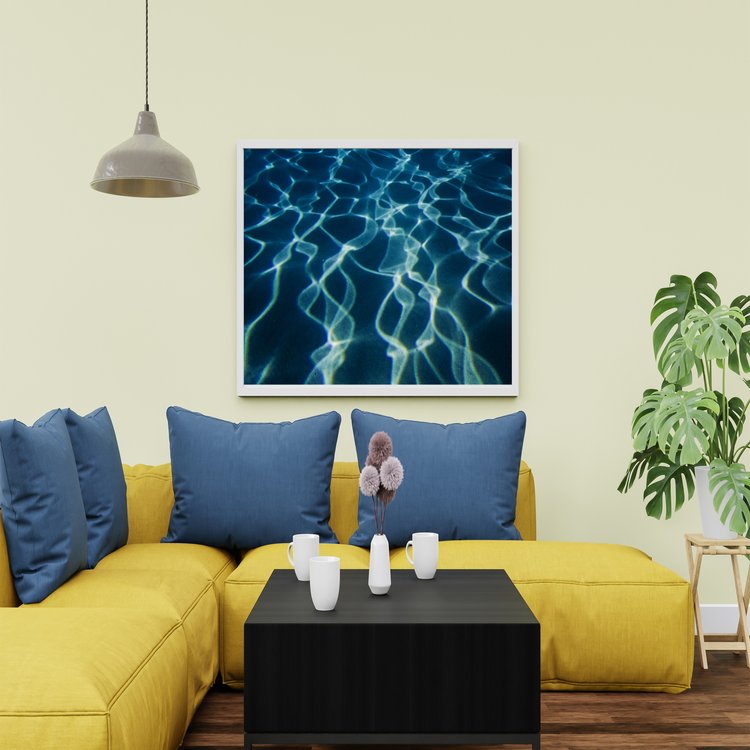 Bold lines dance aross the ocean floor as the sunlight couples with water at the ocean's surfac in this mesmerising image.