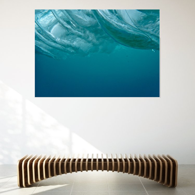 Wave rolls are the powerhouse of a wave, a display of the raw energy and rhythm of the sea. Twist captures the moment when air and water mix creating streamers that twist around the wave roll.